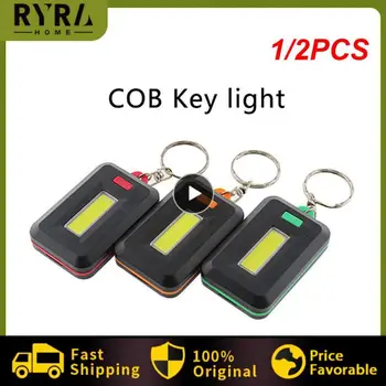 1/2PCS Мини COB LED ключодържател фенерче ключодържател LED аварийна светлина батерия преносимо осветление COB ключодържател фенерче